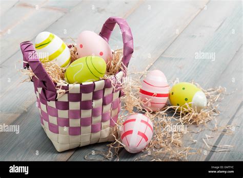Colorful Easter Eggs In Basket Stock Photo Alamy