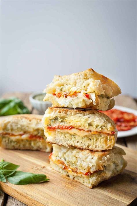 Learn how to make a delicious grilled veggie panini with basil pesto at home. Oven Roasted Tomato and Pesto Panini - This is one of my favorite sandwiches! Fresh pesto, me ...