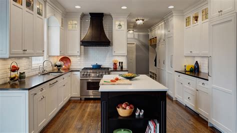 The only thing we had a problem with was early on before fronts of cabinets were painted by hand and the sides and tops sprayed. Not-So-Traditional White Kitchen - Drury Design
