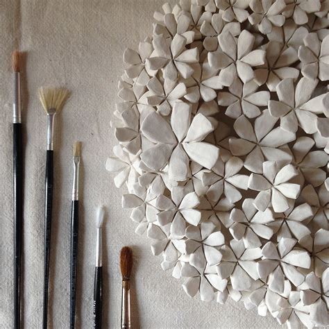 Ege menteş seramik atölyesi on instagram: Handmade ceramic wall mounted flowers made in my studio in ...