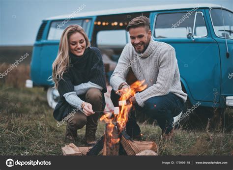 Beautiful Young Couple Roasting Marshmallows Campfire Stock Photo By