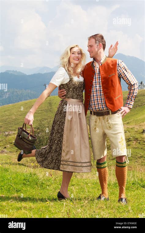 Bavarian Couple In Fashionable Lederhosen And Dirndl Stock Photo Alamy
