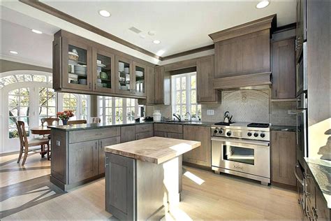 Coffee stained wood tones are then new trend for cabinets in 2021. a clear 2020 trend is mixing natural wood finishes with colored cabinets. Grey Stained Maple Kitchen Cabinets Charming Gray Cabinet Wood | Stained kitchen cabinets, Gray ...