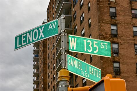 Premium Photo Harlem Street Intersection At Lenox Avenue And West 135