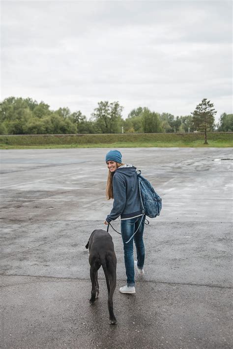 Girl With German Dog In The Park By Stocksy Contributor Danil Nevsky