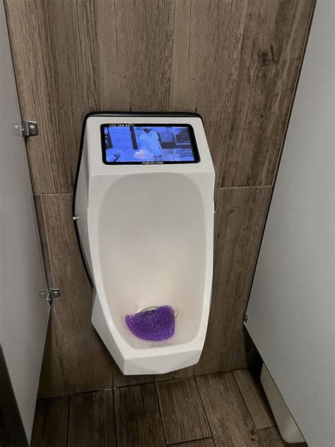 Local Bathroom Has Screens On Their Urinals Rmildlyinteresting