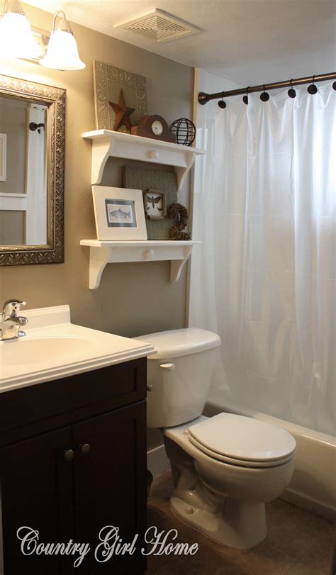 The small bathroom decor idea frees up floor space and gives the room a more open appearance. COUNTRY GIRL HOME : Boys Basement Bath