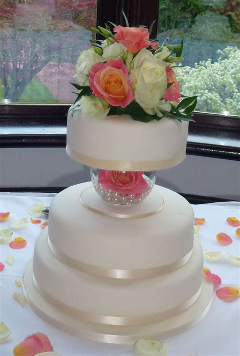 Ivory And Peach Wedding Cake With Fresh Roses And Pearls Wedding