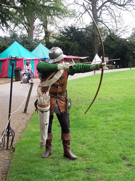 English Archer Firing Arrows From An Actual Yew Wood Longbow At Warwick