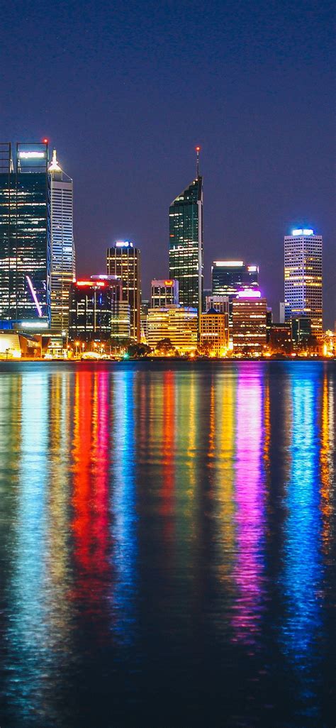 Download Cityscape Buildings Colorful Reflections Night 1125x2436