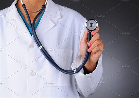 Nurse Holding A Stethoscope High Quality Health Stock Photos