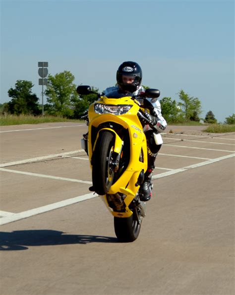 A wheelie is a maneuver on a motorcycle in which the front wheel is raised off the ground. How to Wheelie on a Motorcycle - autoevolution