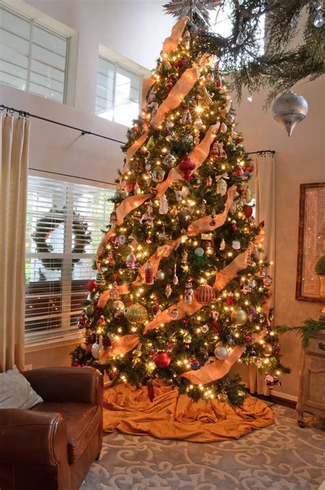 This christmas tree is decorated with small christmas lights and burlap ribbons. 35 Orange Theme Christmas Tree Decorations Ideas ...