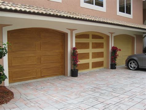 Do paint the garage doors in the same color as the house itself and not the trim color or white (unless white is. Array of color inc: Faux wood garage doors