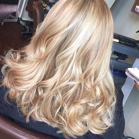 Full Head Of Champagne And Soft Blonde Woven High Lights Dyed Blonde