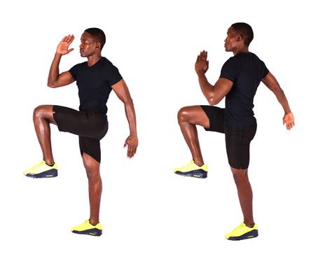 Fit Man Doing High Knees Cardio Exercise