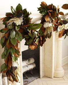 This magnolia garland is made from cut magnolia stems. 12 Easy to Create Leaf Garland Ideas | Inhabit Zone