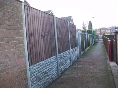Concrete gravel boards are designed to slot between two fence posts and prevent rot at the bottom of a wooden panel, increasing the durability of the fence. 12 inch Rock Face Gravel Board 2