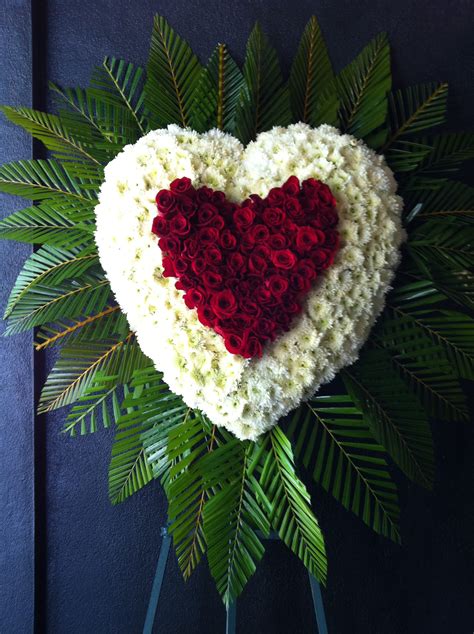Heart Shape Red Roses Within Heart Shape White Mums Surrounded By A Fan