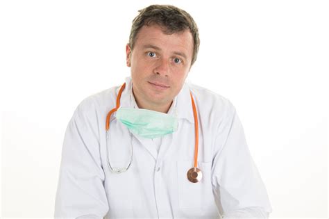 Portrait Of Happy Male Doctor Smiling With His Stethoscope Stock Photo