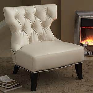 Also known as a slipper chair or occasional chair, these decorative chairs have short legs and sit closer to the ground, making them comfortable as well as. Cream Leather Tufted Armless Chair