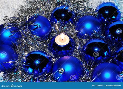Blue Christmas Baubles And A Candle Stock Image Image Of Clinquant