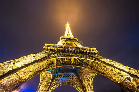 Eiffel Tower Brightly Illuminated At Dusk Editorial Stock Image Image