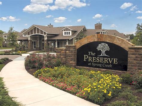 Extensive landscaping and winding walkways provide a lush garden environment. The Preserve At Spring Creek Apartments - Clarksville, TN ...