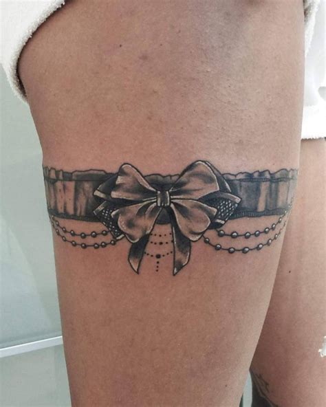 50+ lace belt garter tattoos designs (2020) gun, bow on thigh, leg. Pin on Tattoos