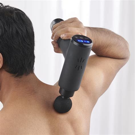 The Hotcold Deep Tissue Massage Gun Hammacher Schlemmer