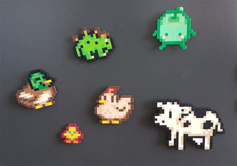 Stardew Valley perler bead collection in progress, next is a pig