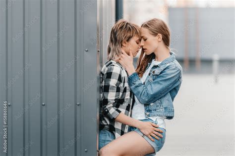 Beautiful Babe Lesbian Couple Hugging And Kissing Outdoors Stock Photo Adobe Stock