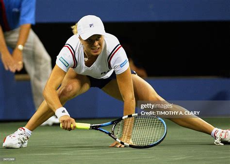 Kim Clijsters Of Belgium Does A Split As She Chases A Shot From News