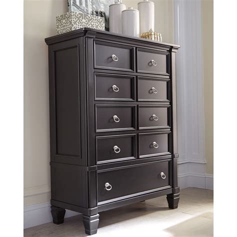 Check spelling or type a new query. Ashley Greensburg 5 Drawer Wood Chest in Black - B671-46