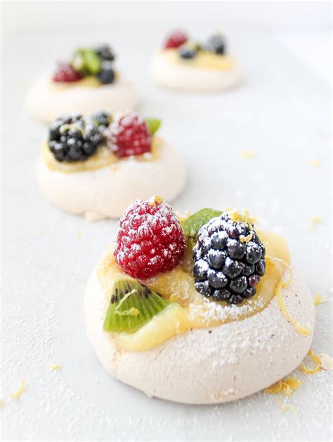 Sweet Mini Pavlova Desserts With A Dollop Of Lemon Curd Topped With Fresh Berries 5 Flour