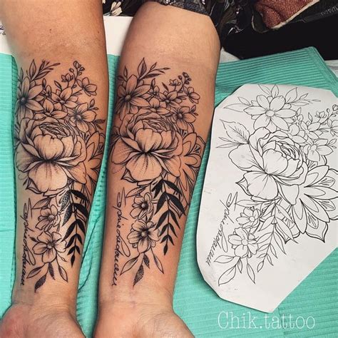 Two Women With Matching Tattoos On Their Arms And Legs Both Have