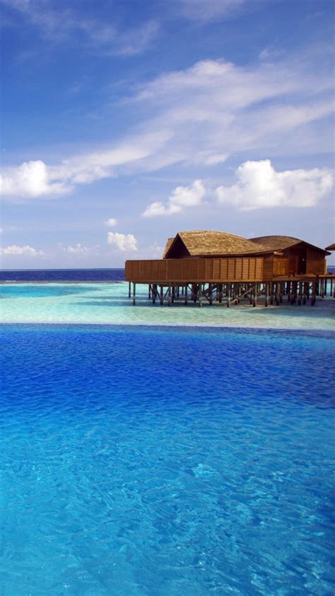 Maldives Tropical Bungalows Ocean Wallpaper 1080x1920