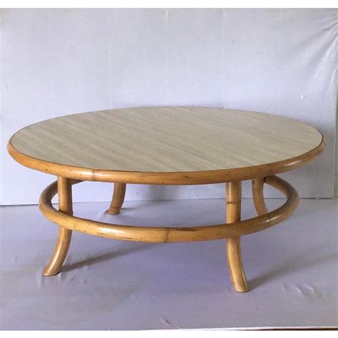 A coffee table made with bent ashwood, finished in clear lacquer and brass rods holding the intricate design in place. Vintage Mid Century Rattan Bamboo Bentwood Coffee Table ...