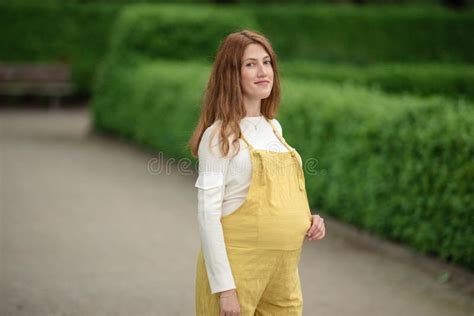 Beautiful Pregnant Girl Walking In The Park Stock Image Image Of