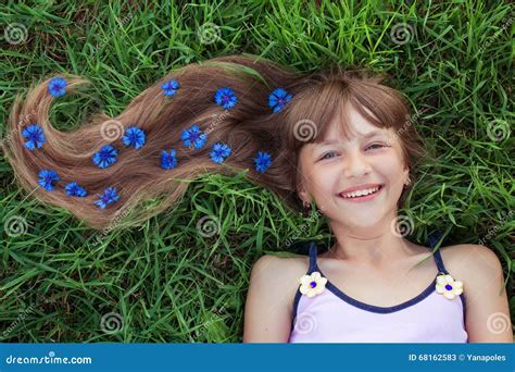 Smiling Girl With Flowers In Her Hair Stock Image Image Of Emotion