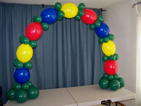 You can make a basic balloon arch with regular balloons or a floating one with helium balloons. How to Make a Balloon Arch: 32+ DIYs | Guide Patterns