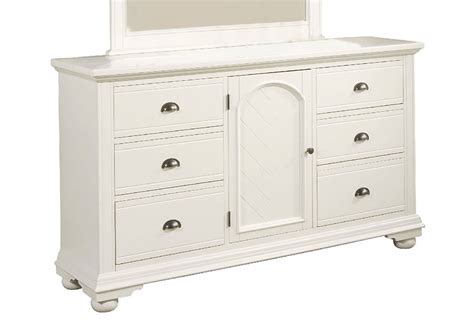 From the heavy top to the beaded drawer fronts this dresser was made to love for generations. Elements Brook White Triple Door Dresser