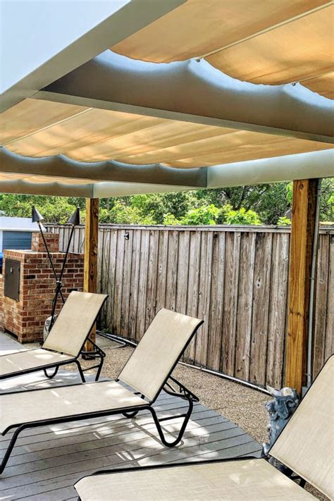 Fabric Retractable Canopies Over Poolside Backyard Patio