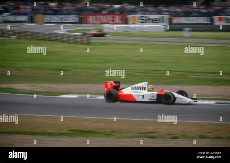 Ayrton Senna At Speed In The Mclaren Mp3 6 During Practice For The 1991