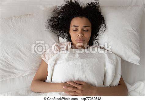 African Woman Sleeping In Bed Close Up Top View Pretty Alone African 30s Woman Lying Down In