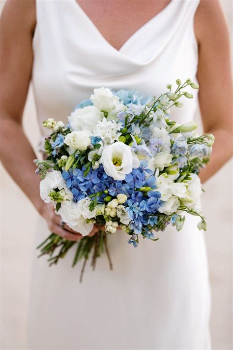 22 beautiful bouquets that can double as your something blue in 2020 blue wedding bouquet