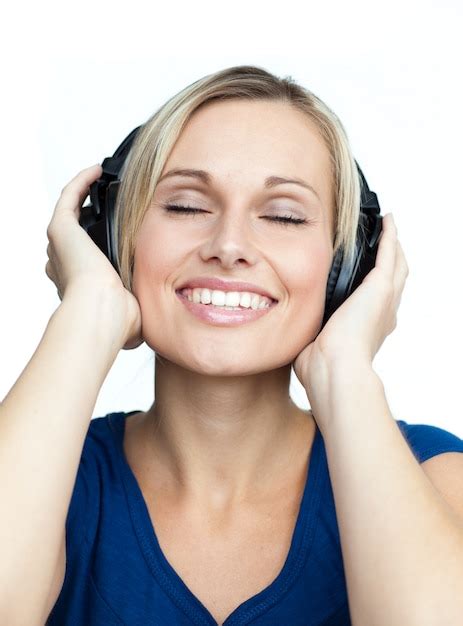 Premium Photo Close Up Of Woman Listening To Music With Headphones On
