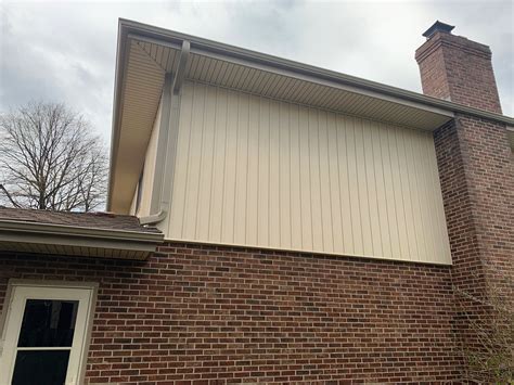 Installation of Board & Batten Premium Vertical Vinyl Siding, Soffit