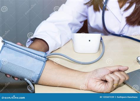 Hand Woman Professional Doctor Check Blood Pressure With Patient Stock