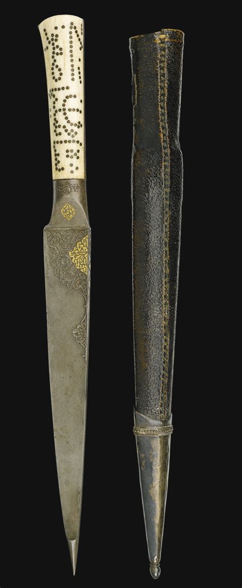 130 a fine safavid watered steel dagger kard with walrus ivory hilt dedicated to shah